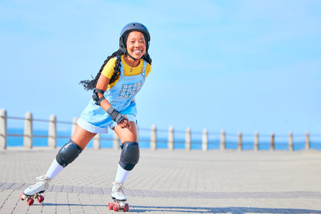 Skating, portrait and woman on promenade for learning, fun and weekend skate. Summer, smile and African person with mockup while on roller skates for a trendy activity, hobby and vacation in streetの写真素材
