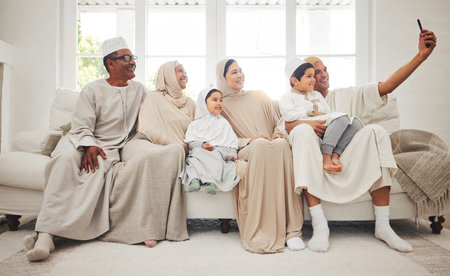 Selfie, Islam and big family on sofa with smile, grandparents and parents with kids in Arab home....