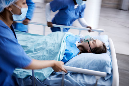 Surgery, emergency and running with doctors and patient in hospital for medical, accident and crisis. Medicine, healthcare and teamwork with group of people in clinic for speed, consulting and nursesの写真素材