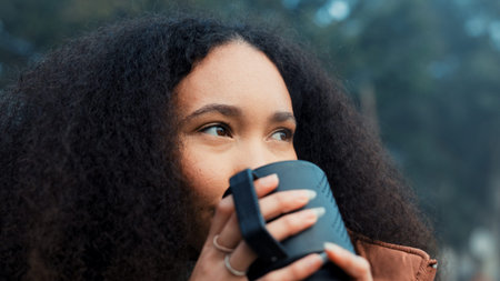 Thinking, nature and a woman with coffee on vacation, relax and camping in the woods. Calm, idea and...