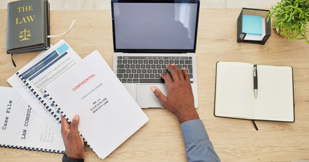 Legal paperwork, divorce lawyer on laptop and top of desk, mockup with contract and settlement...