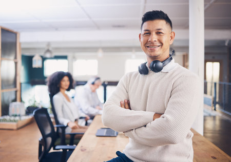 Proud portrait of business man in office startup with leadership, employee management and career confidence. Manager, boss or mature person in tech workspace happy with company technology and jobの写真素材