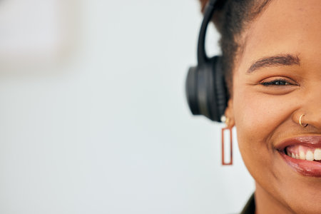 Mockup, portrait and face of a woman with headphones for music, advertising podcast or streaming radio. Happy, space and half face of a girl with a smile while listening or streaming sound or audioの写真素材