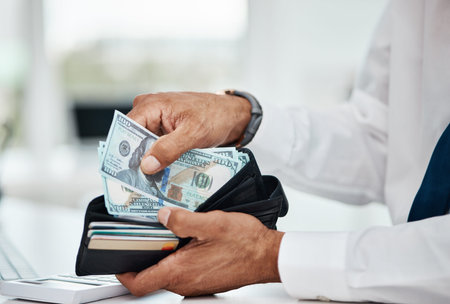 Business man, hands and wallet of dollars for finance, economy and banking investment. Closeup, rich...