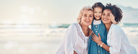 Portrait of a mother, grandmother and child at the beach while on family vacation, holiday or...