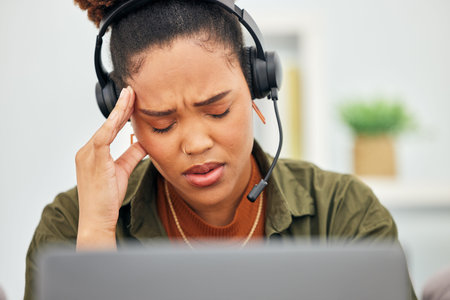 Stress, call center and headache of woman at laptop in customer service agency with pain, burnout or...