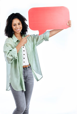 Woman portrait, smile and hand pointing to speech bubble in studio for social media, contact or info...