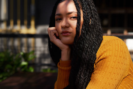 Today should be all about you. Cropped shot of a beautiful young woman out in the city during the...