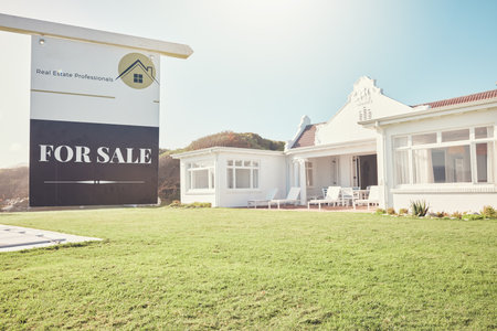 House, property and for sale sign, real estate and advertising loan or mortgage, investment and selling home. Building, lawn and opportunity with realtor service, poster and finance with insuranceの写真素材