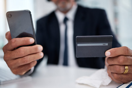 Man, hands and credit card with phone in office for ecommerce, accounting budget or banking...