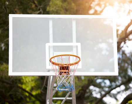 Sports, basketball and target with net on court for training, goals and competition. Games, club and fitness with fabric hoop in playground stadium for champion, challenge and winner tournamentの写真素材