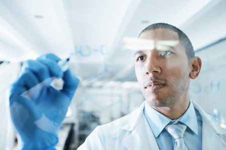 Solution, science and writing with man in laboratory for medical, research and planning. Analysis, healthcare and medicine with scientist and brainstorming for chemistry, pharmacy and vaccineの写真素材