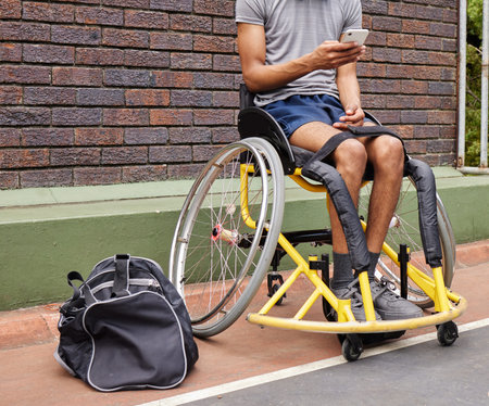 Sports, wheelchair basketball and a man with a disability on a court for fitness, training or...