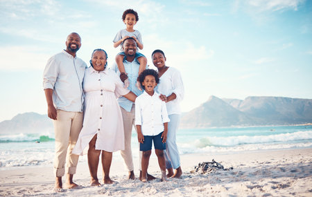 Happy, travel and portrait of black family at beach for smile, summer break and bonding on vacation. Relax, holiday trip and generations with parents and children for quality time, sunshine and funの写真素材
