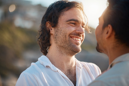 Love, smile and gay couple, men hug and laugh on romantic summer vacation together in Thailand. Sun, care and island, happy interracial lgbt people embrace in nature on fun outdoor holiday with prideの写真素材