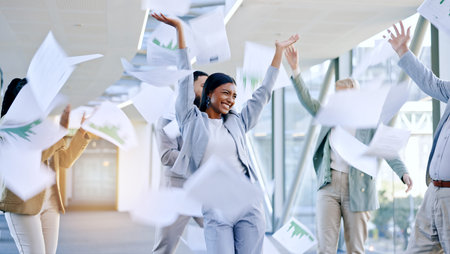 Documents in air, celebration and business people dance in office for achievement, winner and goals....