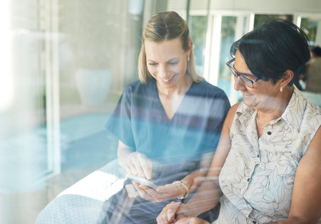 Happy woman, nurse and phone with senior in elderly care for support, consultation or healthcare...