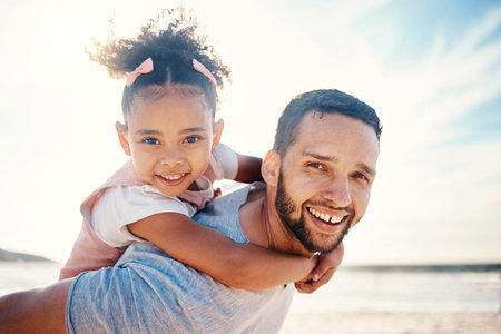 Portrait, piggyback and father with girl at beach on summer holiday, family vacation or travel...