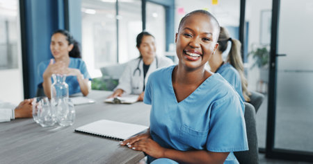 Black woman, face or nurse in hospital meeting for medical planning, life insurance medicine or treatment training. Smile, happy and healthcare worker portrait in teamwork, collaboration or diversityの写真素材