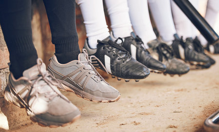 Shoes, softball and sports, team and fitness with competition, people at stadium with mission. Athlete group, exercise and trust with support, collaboration and baseball player in club with footwearの写真素材
