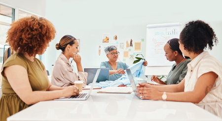 Creative woman, fashion designer and meeting in team brainstorming, planning or clothing ideas at...