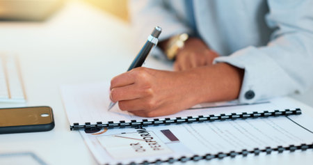Closeup man hands filling in company paperwork. Professional individual finalizing business...