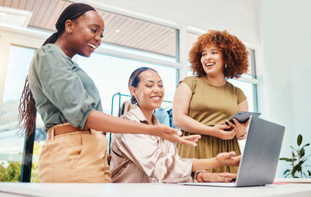 Employees, teamwork and review on tech in office with creative, ideas for fashion or ecommerce on...