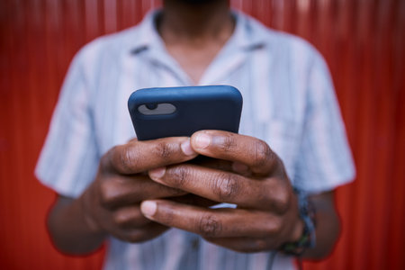 Person hands, smartphone and closeup, communication and social media, typing and online chat with technology. Using phone, mobile app and text message with internet connectivity, network and contactの写真素材