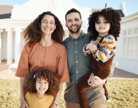 Family, portrait and parents with children outdoor, love and support with mom, dad and girl kids in home garden. Bonding, care and affection with people on the lawn and happiness together with smileの写真素材
