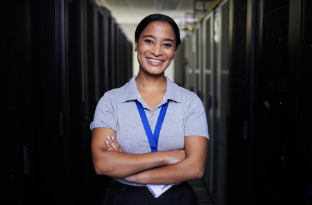 Server room, portrait or happy woman for online cybersecurity glitch, machine or servers system. IT support, data center or proud female engineer fixing network for information technology solutionの写真素材