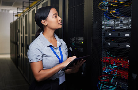 Woman, engineering tablet and server room, data center inspection or system solution for cybersecurity coding. IT person on digital technology, cables check and business power or programming hardwareの写真素材