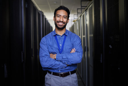 Server room, portrait or happy man for online cybersecurity glitch, machine or servers system. IT support, smile or proud engineer fixing network for information technology solution in data centerの写真素材