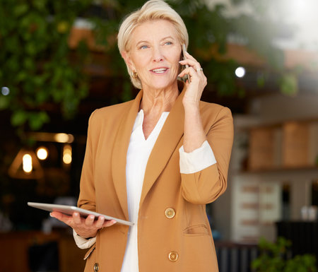 Woman, phone call and thinking of cafe communication, e commerce management and sales news. Manager or small business owner talking with ideas on mobile chat, digital tablet and restaurant networkingの写真素材