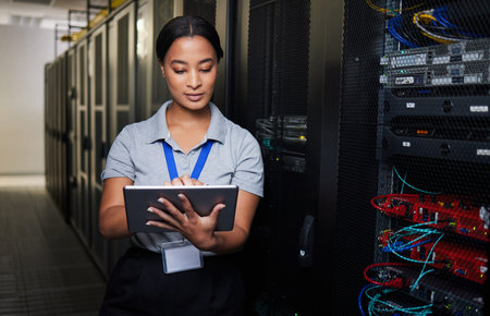 Woman, tablet and server room in inspection, programming and coding with system solution and...