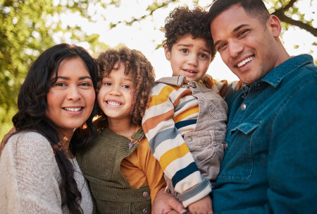 Park, portrait and happy kids, mother or father smile for green woods, morning walk and bond in wellness garden. Natural forest, family happiness or face of children, mama and papa together in Mexicoの写真素材