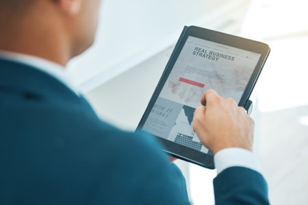 Business man, hand and tablet, screen and website with strategy, reading corporate news and research. Digital, professional project planning and scroll online with article, information for growthの写真素材