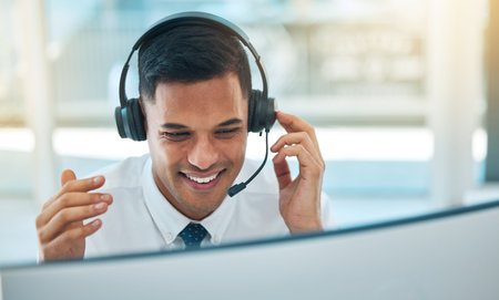 Man, callcenter and phone call, contact us and headset with mic, CRM and communication, smile with...
