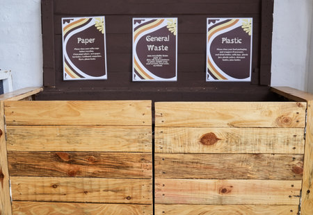 Sign, recycling and sustainability with a wooden box for paper, plastic or general waste disposal. Environment, green and nature conservation with a crate for an eco friendly campaign on earth dayの写真素材