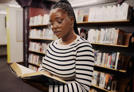 Black woman, library and books for school, student reading or education, English and language...