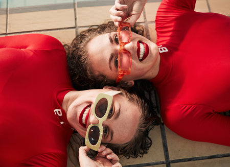 Women portrait, sunglasses and happy with fashion at a pool with gen z and style of girl friends...