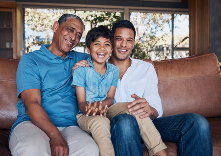 Portrait, laugh and happy family generation of child, father and grandfather relax, connect and smile for funny joke. Lounge couch, comedy humour and sitting kid, dad and grandpa bond in Brazil homeの写真素材