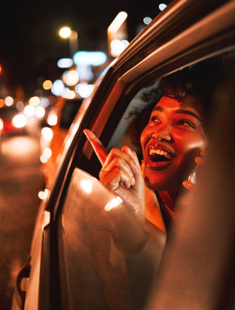 Happy black woman, phone call and car at night in city taxi, communication or networking. Excited African female person smile in conversation or late evening discussion on mobile smartphone in travelの写真素材