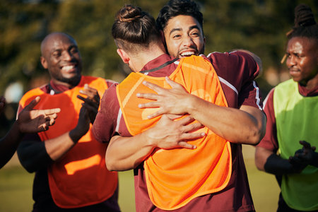 Hug, sports and rugby team celebrate teamwork, achievement or winning game, match or tournament competition. Embrace, group winner celebration and men happy, excited or applause for challenge successの写真素材