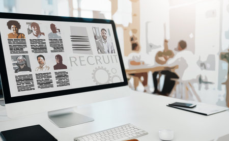 Recruitment, website and search on computer screen in office with people in human resources and we...