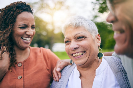 Elderly parents, happy woman or laughing at park with love, care and bond on outdoor travel to relax. Senior father, mature mother or face of funny adult daughter in nature on family holiday togetherの写真素材