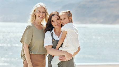 Beach, portrait and girl with her grandmother and mother on vacation, adventure or holiday. Happy,...