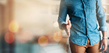 Business person, handshake offer and opportunity for marketing onboarding, startup and graphic designer deal. Creative shaking hands in interview, agreement or thank you for partnership POV on mockupの写真素材