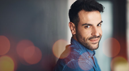 Portrait, business and man in office on bokeh, startup company and workplace. Face smile, designer and professional employee, creative worker and happy entrepreneur on mockup space in Australia.の写真素材