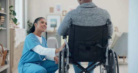 Senior man, wheelchair and medical support with nurse help and healthcare in retirement home. Caregiver, employee and elderly care with person with disability with patient ready for physiotherapyの写真素材