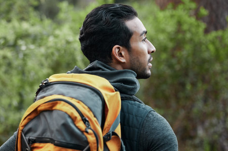 Man, backpack and thinking with view, fitness and camping travel in the forest for holiday....